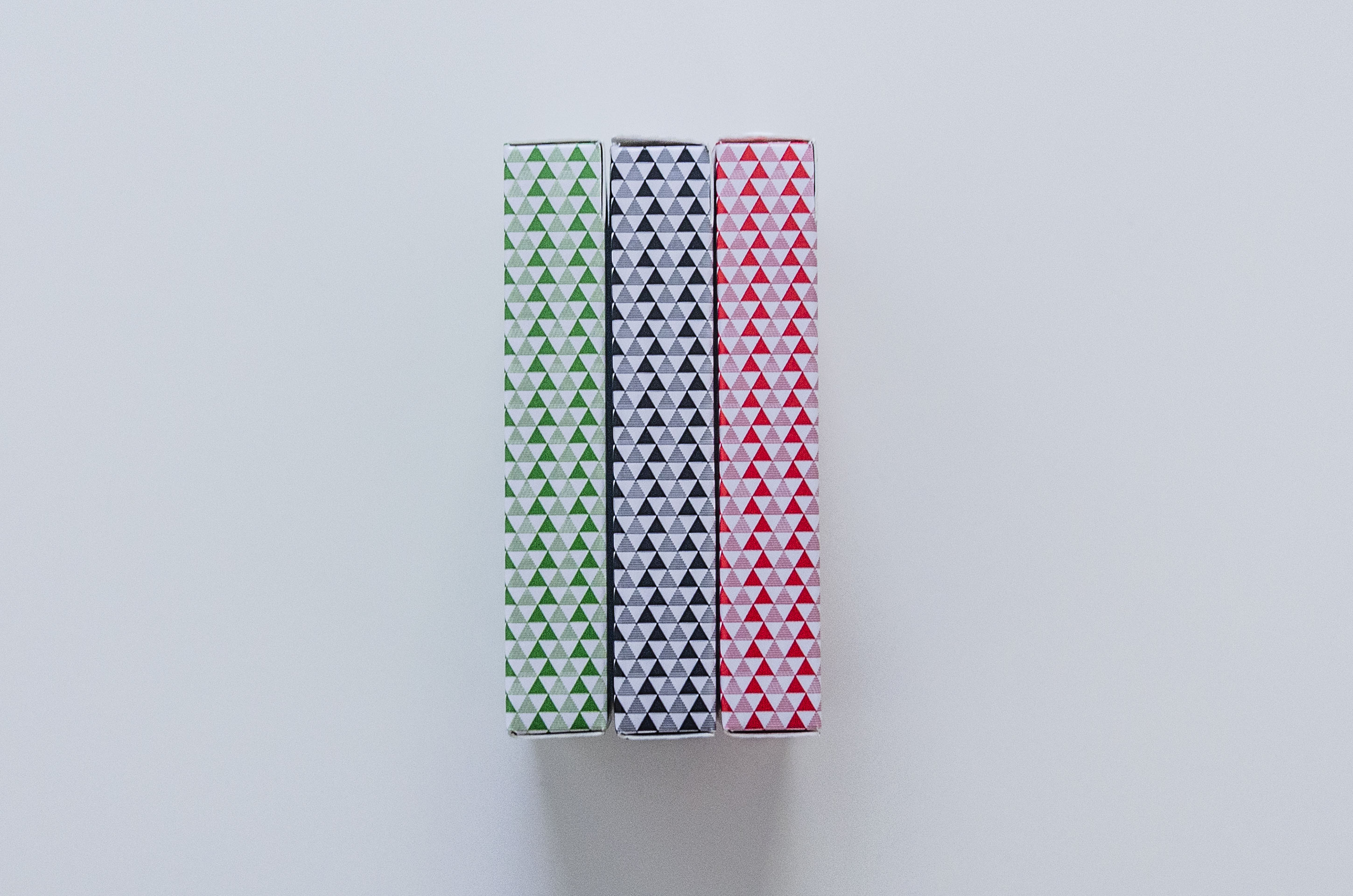 Minimalist Italian Playing Card tuck boxes for each style.